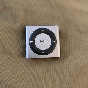 iPod shuffle 4th gen. 2GB with charger. Dark gray / black